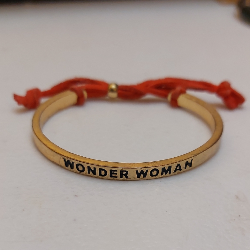DC Comics Wonder Women Gold Tone Cuff Bracelet With Adjustable Suede Leather